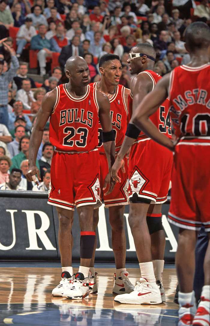 Chicago Bulls' Michael Jordan, Scottie Pippen, and Horace Grant during the game against the Orlando Magic at the Orlando Arena.